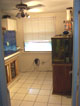 My little Fish Room with the 300 gal. Also a glass 120 gal. Oceanic Reef Ready on a Oak stand with Live rock I collected in the early 90's from the Gulf off of Clearwater, Fl., back when it wasn't unlawful.