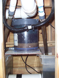 3" pvc over flow from center of tank and one return from each rubbermaid sump. A Cartridge Filter in the center.