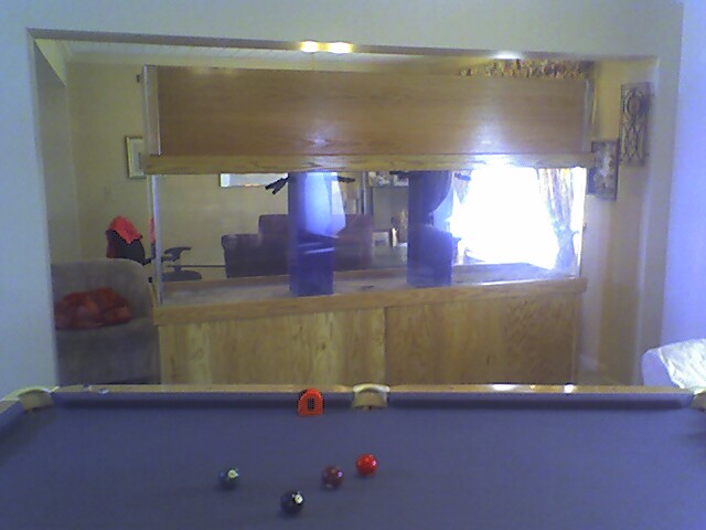 And this is from the &quot;living&quot; room. Doesn&#039;t everyone have a pool table in their...