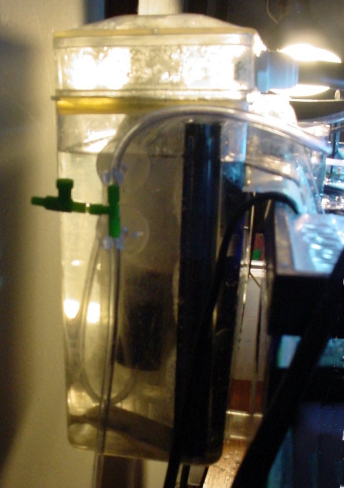 Air block in bubble deflector cannister, overflow line to sump.