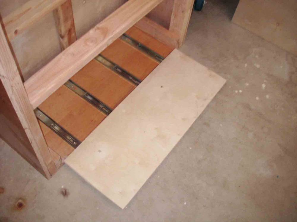 Bottom slide shelf