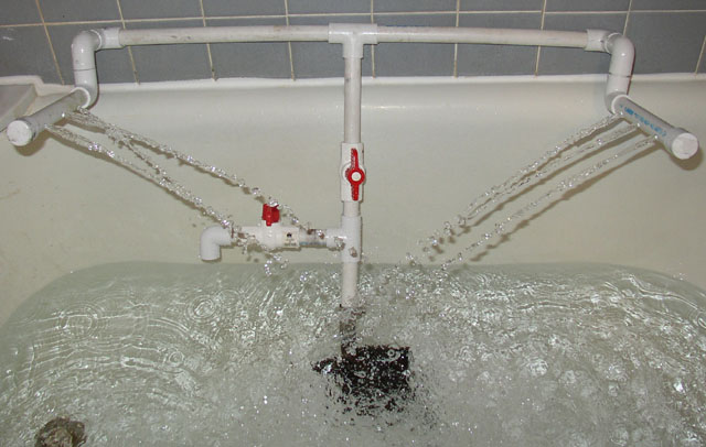 My DIY Spray bars for the 29 gallon tank.  Very simple to build and is working great.  The pump is...