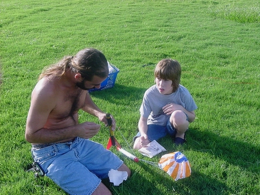 Me and step son with rocket