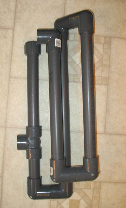 DIY overflow, using schedule 80 PVC, shown prior to applying PVC cement; as it appears installed