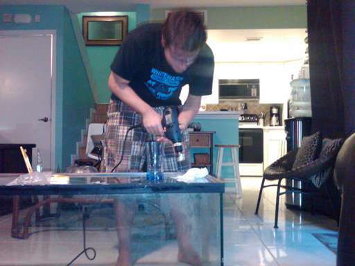 Drilling the in tank sump hole.