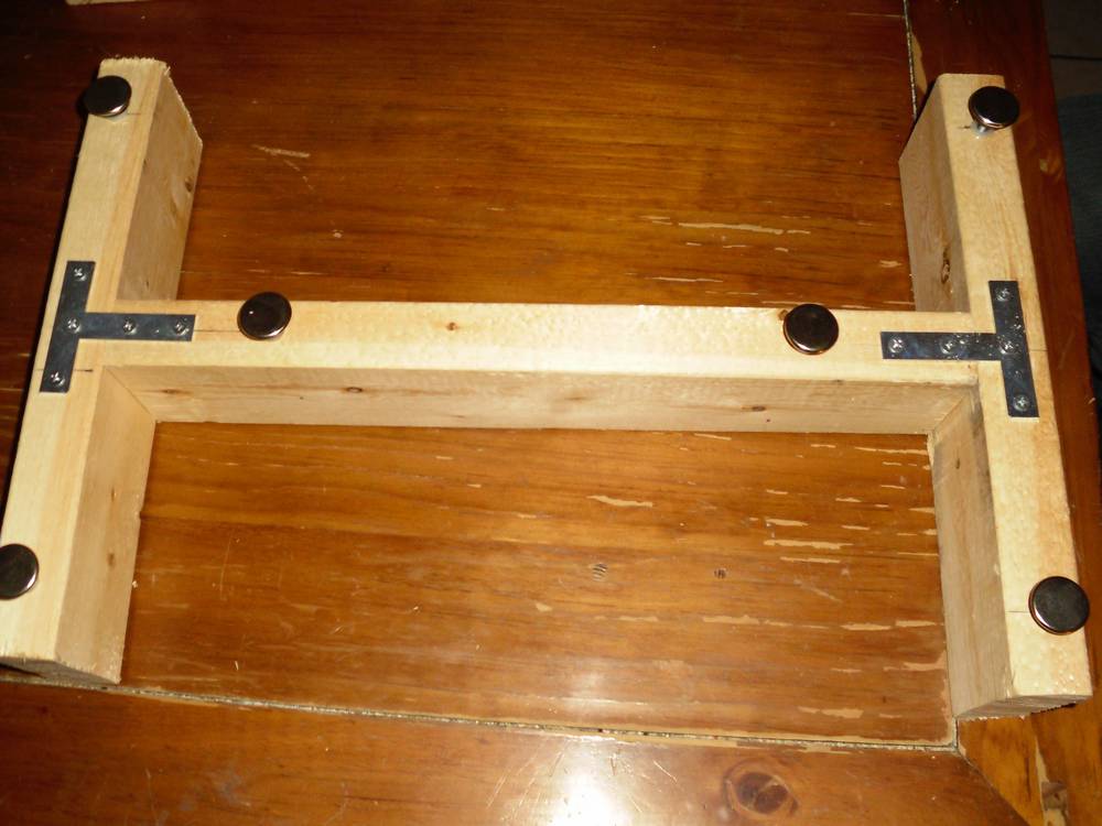 Bottom of stand notice adjustable feet and extra braces for stability.