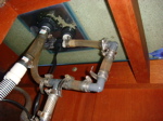 view of equipment entering bottom of salt water tank