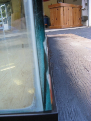 The chips on the other side. Also sanded down. All are pretty small. I have no idea what the previous owner was doing to this thing to chip it so much.