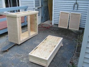 The stand, hood, and doors all sanded and ready for pre-stain and stain.