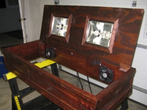 Here is the inside of the hood. Soon there will be two 48" T5 Actinic + bulbs and reflectors in there run by an Icecap 660. A single blueline magnetic ballast runs the two 250W halides.