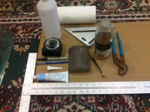 materials you would need: paper towel,alcohol,tape measure,rafters square,oil,permanent marker,pen,sanding block,pliers,silicone,and of course glass cutter
