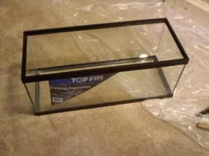 ANOTHER AQUARIUM? she asks. no honey you won't see this one! it goes INSIDE? the cabinet. lol