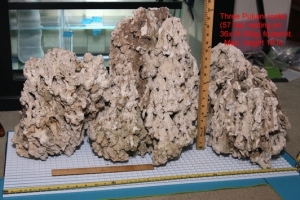 Close-up view.  Tallest rock is 18 inch. Foot print: 36 x 18 x 24.  Water displacement measured and estimate to be 5 gallons.
