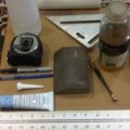 materials you would need: paper towel,alcohol,tape measure,rafters square,oil,permanent marker,pen,sanding block,pliers,silicone,and of course glass cutter