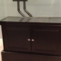 View of cabinet with knobs from afar