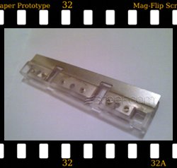 http://www.3reef.com/images/misc/products/mag_flip_scraper.jpg